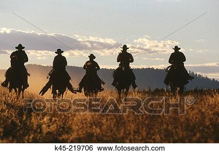 Cowboy silhouettes. Ponderosa Ranch. Central Oregon. USA View Large Photo Image Stock Photograph - Cowboy silhouettes. Ponderosa Ranch. Central Oregon. USA. Fotosearch