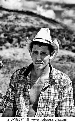 Cowboy with hat in ranch outside of Cienfuegos Cuba View Large Photo Image Stock Photograph - Cowboy with hat in ranch outside of Cienfuegos Cuba. Fotosearch