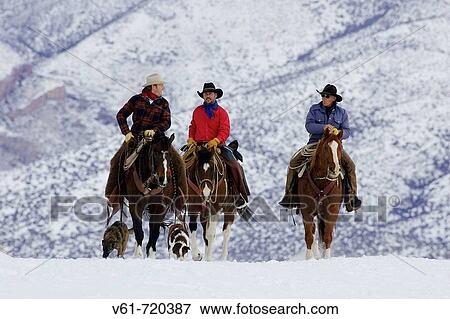 Cowboys out for a ride during winter in Shell, Whyoming, Usa View Large Photo Image Stock Photo - Cowboys out for a ride during winter in Shell, Whyoming, Usa. Fotosearch