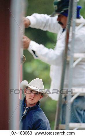 Cowboys working in corral. Texas. USA View Large Photo Image Stock Image - Cowboys working in corral. Texas. USA. Fotosearch