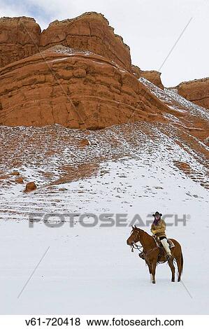 Cowgirl out for a ride in winter, Shell, Wyoming, Usa View Large Photo Image Stock Photo - Cowgirl out for a ride in winter, Shell, Wyoming, Usa. Fotosearch