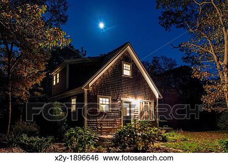 Cozy bungalow at night, Martha's Vineyard, Massachusetts, USA View Large Photo Image Stock Photograph - Cozy bungalow at night, Martha's Vineyard, Massachusetts, USA. Fotosearch