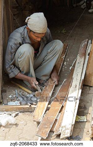 Craftsman in the Chor Bazaar in Mumbai, India. View Large Photo Image Stock Image - Craftsman in the Chor Bazaar in Mumbai, India.. Fotosearch