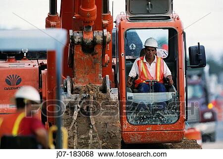 Crane operator. Texas. USA View Large Photo Image Stock Photo - Crane operator. Texas. USA. Fotosearch
