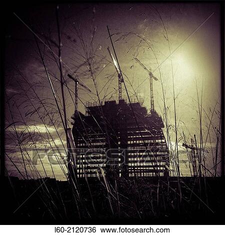 Cranes and new Building in Constrution, Madrid, Spain. View Large Photo Image Stock Photograph - Cranes and new Building in Constrution, Madrid, Spain.. Fotosearch