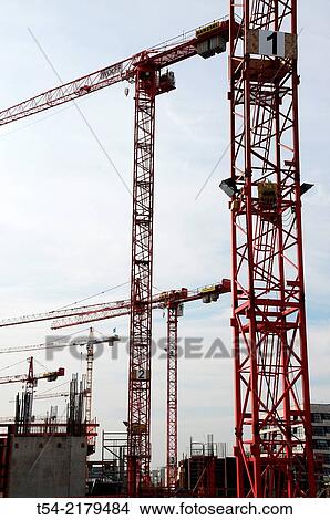 Picture - Cranes at a construction site near the main station Munich. Fotosearch