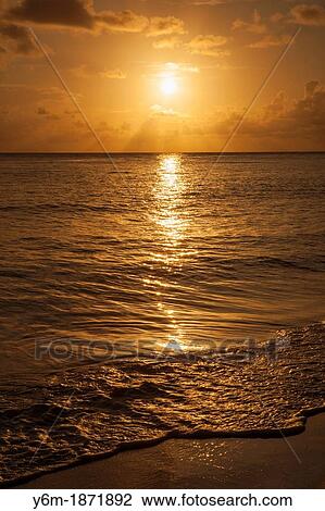 Stock Image - Crash Boat Beach, Puerto Rico, sunset. Fotosearch