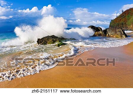 Stock Photo - Crashing waves and rocks at Hanakapi'ai Beach, Na Pali Coast, Island of Kauai, Hawaii USA.. Fotosearch