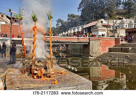 cremation ceremony at Pashtupatinath, Kathmandu, Nepal. View Large Photo Image Stock Image - cremation ceremony at Pashtupatinath, Kathmandu, Nepal.. Fotosearch