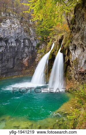 Stock Photo - Croatia - Plitvice Lakes National Park, waterfall between lakes, central Croatia, UNESCO.. Fotosearch