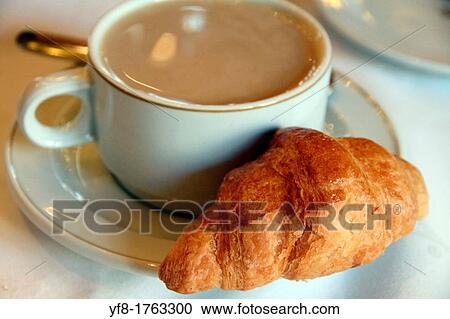 Croissant and coffee View Large Photo Image Stock Image - Croissant and coffee. Fotosearch