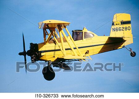 Crop duster airplane right after take-off at an airstrip just North of Oaksdale. Withman County, Washington, USA View Large Photo Image Stock Image - Crop duster airplane right after take-off at an airstrip just North of Oaksdale. Withman County, Washington, USA. Fotosearch