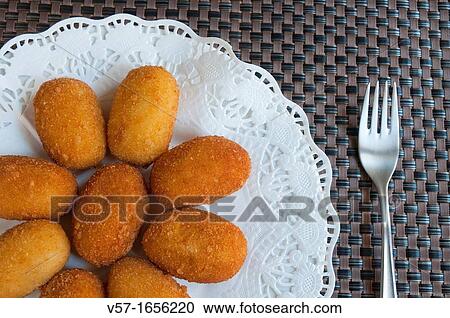 Croquettes serving. Close view. View Large Photo Image Stock Image - Croquettes serving. Close view.. Fotosearch