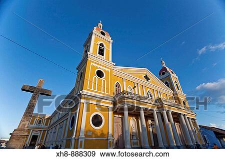 Stock Photo - Cross outside the cathedral, Parque Colon (aka Central Park), Granada, Nicaragua. Fotosearch