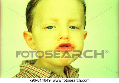 Stock Photo - Cross processed humorous toddler portrait. Fotosearch