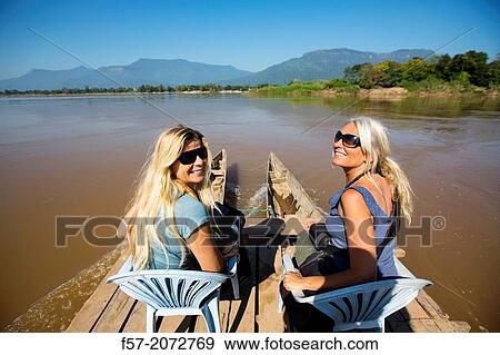 Crossing the Mekong River in Champasak, Laos. View Large Photo Image Stock Photo - Crossing the Mekong River in Champasak, Laos.. Fotosearch