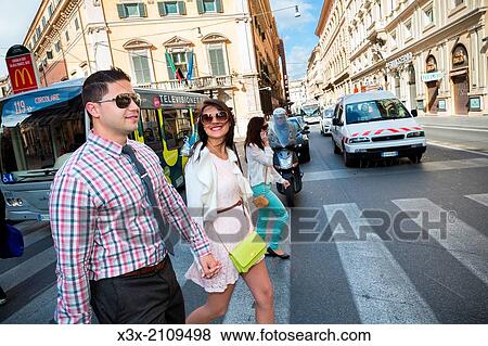 Crossing the street. Rome, Italy. View Large Photo Image Stock Photo - Crossing the street. Rome, Italy.. Fotosearch