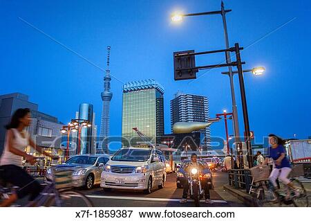 Crosswalk in Kaminarimon street, in background Sky Tree and Asahi building, Asakusa District, Tokyo, Japan View Large Photo Image Stock Photo - Crosswalk in Kaminarimon street, in background Sky Tree and Asahi building, Asakusa District, Tokyo, Japan. Fotosearch