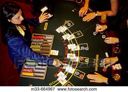 Stock Photo - Croupier in the Grand Casino of Santander city, Cantabria. Spain. Fotosearch