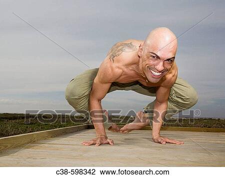 Crow Posture on a Wooden Platform View Large Photo Image Stock Image - Crow Posture on a Wooden Platform. Fotosearch