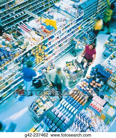 Stock Image - Crowded grocery store aisle. Fotosearch