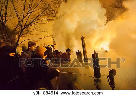 Picture - Crowds of visitors and Pratt Institute students and faculty welcome in the New Year, Tuesday, January 1, 2013 at the school's steam generating plant in Brooklyn in New York. Fotosearch