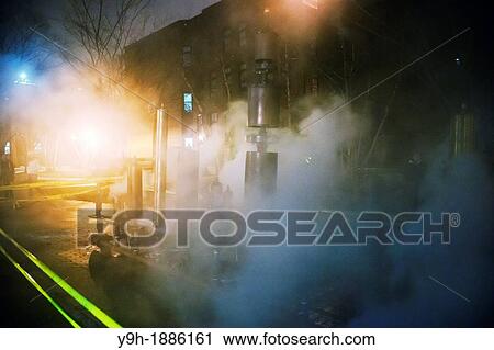 Stock Image - Crowds of visitors and Pratt Institute students and faculty welcome in the New Year, Tuesday, January 1, 2013 at the school's steam generating plant in Brooklyn in New York. Fotosearch