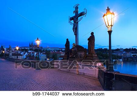 CRUCIFIXION AT CALVERY STATUES KING CHARLES IV BRIDGE PRAGUE CZECH REPUBLIC View Large Photo Image Stock Photo - CRUCIFIXION AT CALVERY STATUES KING CHARLES IV BRIDGE PRAGUE CZECH REPUBLIC. Fotosearch