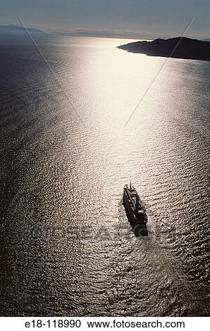 Stock Image - Cruise ship heading Northwest out of Vancouver on a cruise through the inside passage to Alaska. South coast of British Columbia, Canada. Fotosearch