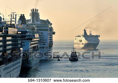 Stock Photo - Cruise ships in harbour, Civitavecchia, Lazio, Italy. Fotosearch