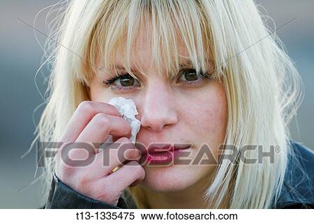Stock Photography - Crying face, young woman. Fotosearch