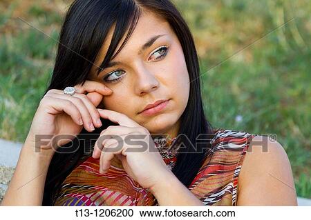 Stock Image - Crying young woman. Fotosearch