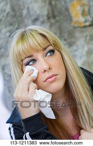 Stock Image - Crying young woman. Fotosearch