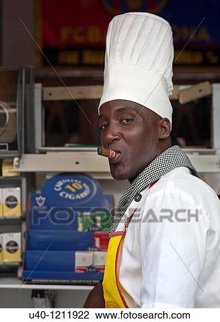 Cuba, Chef smoking a cigar View Large Photo Image Stock Image - Cuba, Chef smoking a cigar. Fotosearch