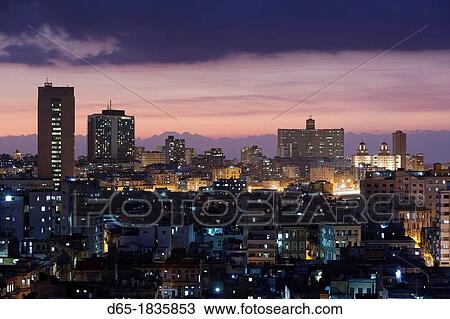 Cuba, Havana, elevated city view above Central Havana looking west, dusk View Large Photo Image Stock Image - Cuba, Havana, elevated city view above Central Havana looking west, dusk. Fotosearch