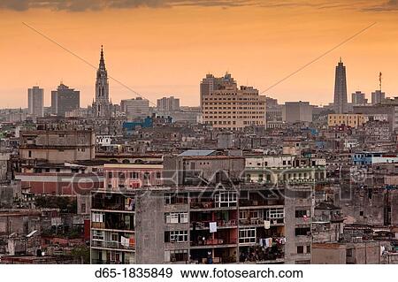 Cuba, Havana, elevated city view above Central Havana looking west, dusk View Large Photo Image Stock Photo - Cuba, Havana, elevated city view above Central Havana looking west, dusk. Fotosearch