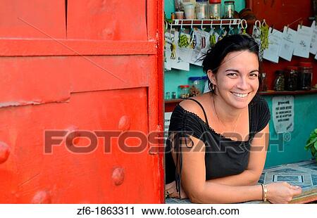 Cuba Havana Habana woman selling food on Hamel Street in window smiling View Large Photo Image Stock Image - Cuba Havana Habana woman selling food on Hamel Street in window smiling. Fotosearch