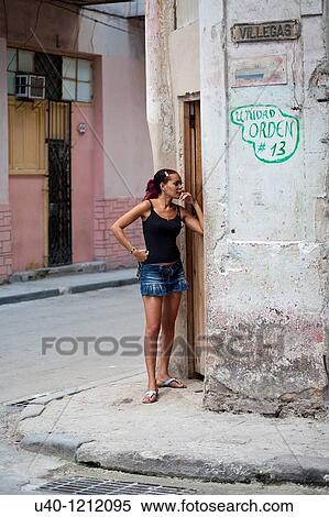 Cuba, Havana Vieja, woman on street corner View Large Photo Image Stock Photography - Cuba, Havana Vieja, woman on street corner. Fotosearch