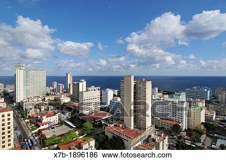 Cuba, Havana, View of high rise buildings in El Vedado View Large Photo Image Stock Photograph - Cuba, Havana, View of high rise buildings in El Vedado. Fotosearch