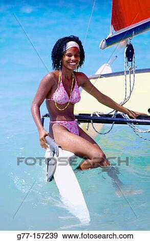 Cuba, Havana. Young mulatto woman at Playa Santa Maria, Playas del Este View Large Photo Image Stock Photo - Cuba, Havana. Young mulatto woman at Playa Santa Maria, Playas del Este. Fotosearch