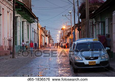 Cuba, Sancti Spiritus Province, Trinidad, street view, dusk View Large Photo Image Stock Photograph - Cuba, Sancti Spiritus Province, Trinidad, street view, dusk. Fotosearch