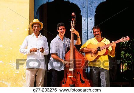 Cuban band playing in a street of Trinidad de Cuba. Cuba View Large Photo Image Stock Photograph - Cuban band playing in a street of Trinidad de Cuba. Cuba. Fotosearch