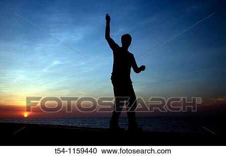 Cuban fisherman fishing at sunset on the Malecon in Havana View Large Photo Image Stock Image - Cuban fisherman fishing at sunset on the Malecon in Havana. Fotosearch