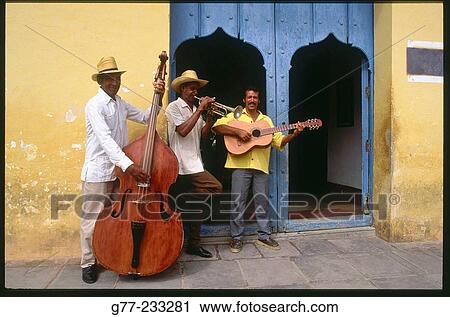 Cuban musicians playing in a streets of Trinidad de Cuba. Cuba View Large Photo Image Stock Image - Cuban musicians playing in a streets of Trinidad de Cuba. Cuba. Fotosearch