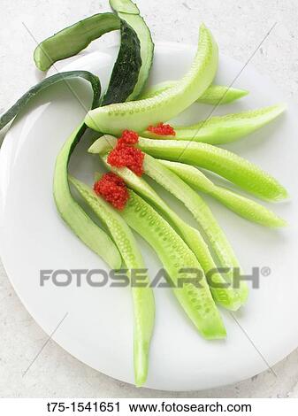 Cucumber with red lumpfish roe View Large Photo Image Stock Image - Cucumber with red lumpfish roe. Fotosearch