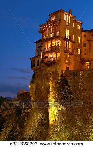 Stock Image - Cuenca, Casas Colgantes, Hanging houses at dusk, UNESCO World Heritage Site. Castilla-La Mancha. Spain.. Fotosearch
