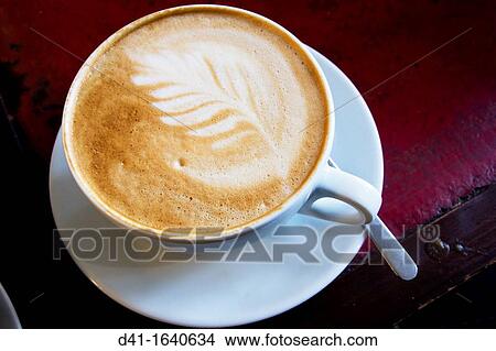 Cup cafe latte leaf View Large Photo Image Picture - Cup cafe latte leaf. Fotosearch