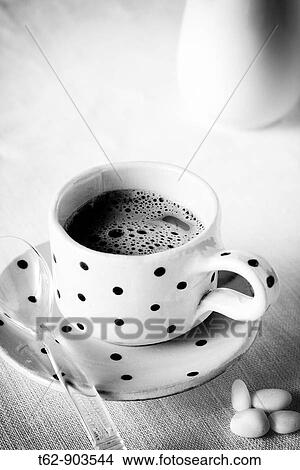 Cup of coffee and sugar View Large Photo Image Picture - Cup of coffee and sugar. Fotosearch