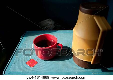 Cup of tea and teapot in Indian train View Large Photo Image Stock Photo - Cup of tea and teapot in Indian train. Fotosearch
