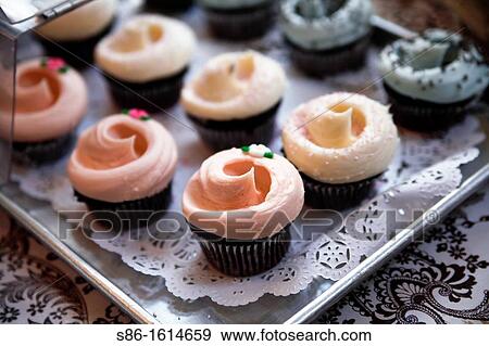 Cupcakes on a Display Tray View Large Photo Image Stock Photo - Cupcakes on a Display Tray. Fotosearch